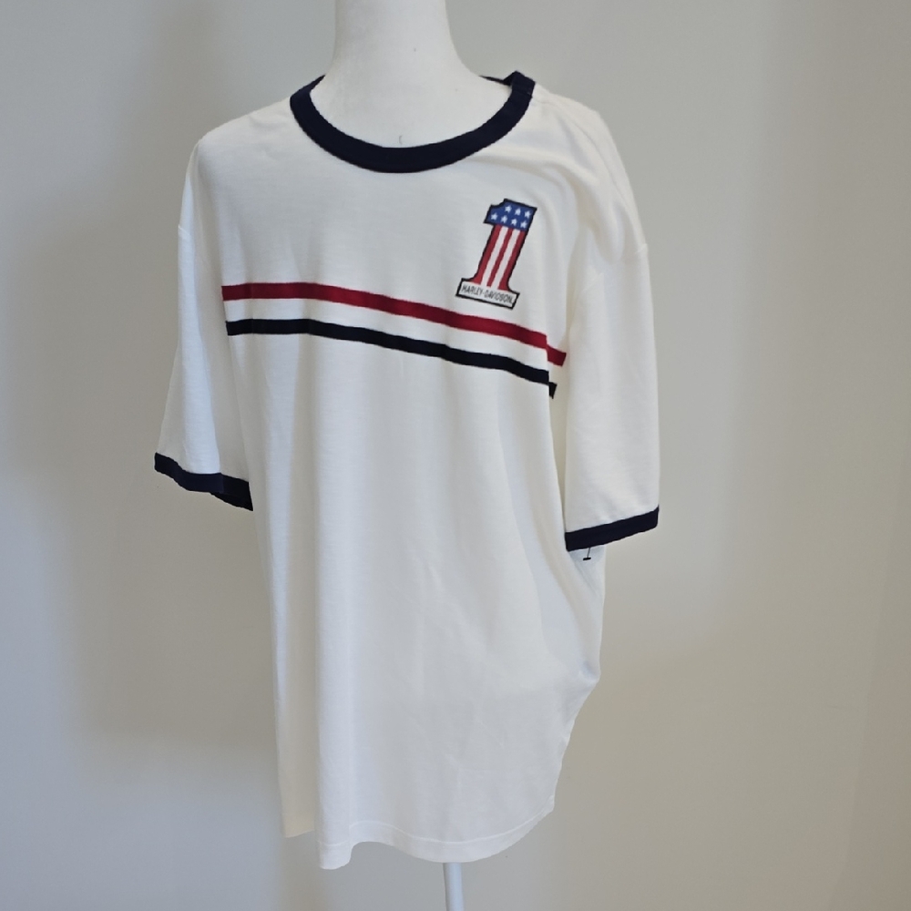 Harley-Davidson Tee. Red & Blue Strip Across Chest. Back Of Tee Is Alll White.